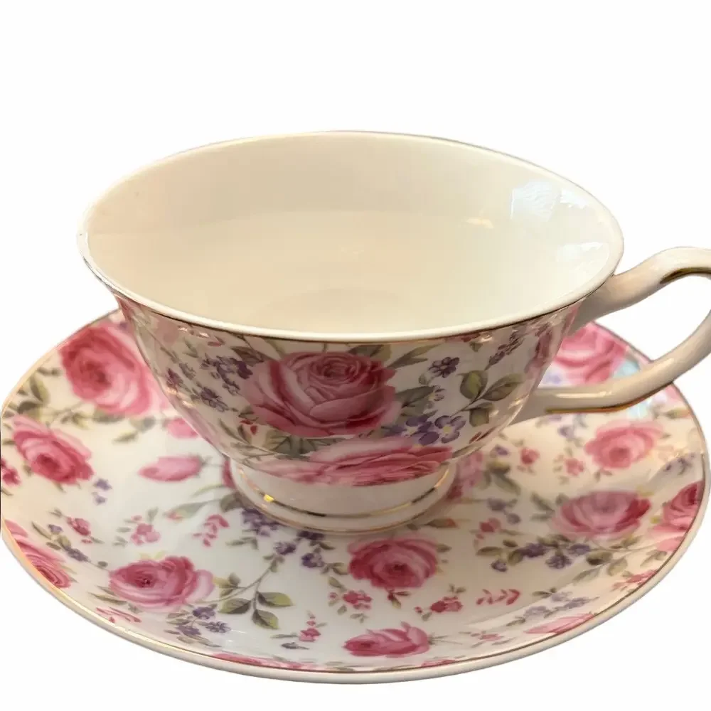 Three modern coordinating cup and saucer sets in shades of pink.